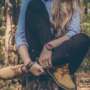 sitting on a log