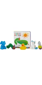 Five rubber squirty toys and a water proof book