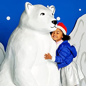 child hugging polar bear 