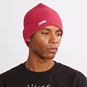 man wearing neff pink daily beanie