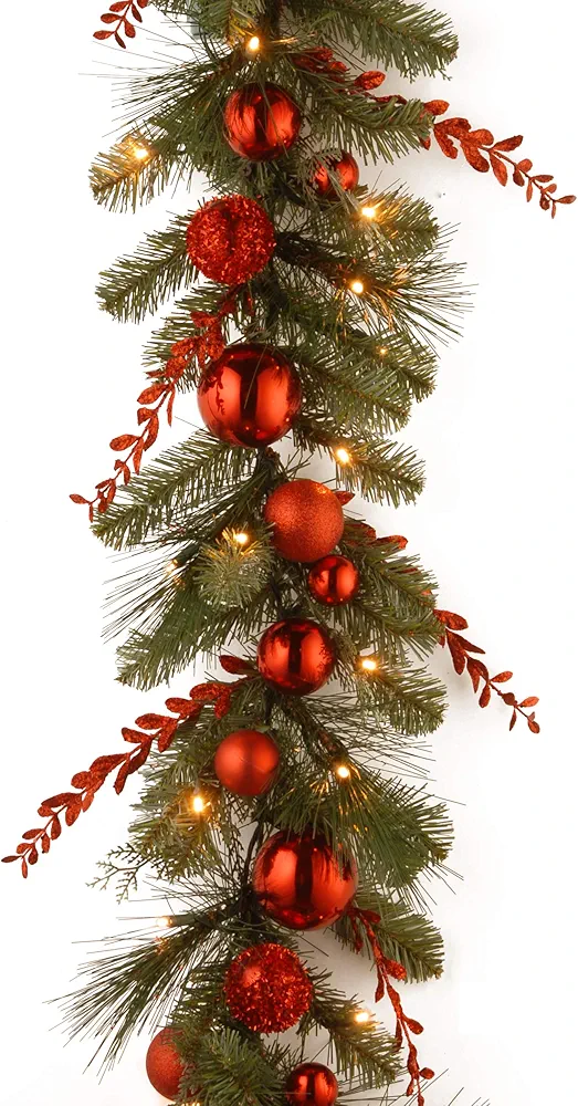 National Tree Company Pre-Lit Artificial Christmas Garland, Green, Evergreen, White Lights, Decorated With Glittered Stems, Ball Ornaments, Battery Powered, Christmas Collection, 9 Feet